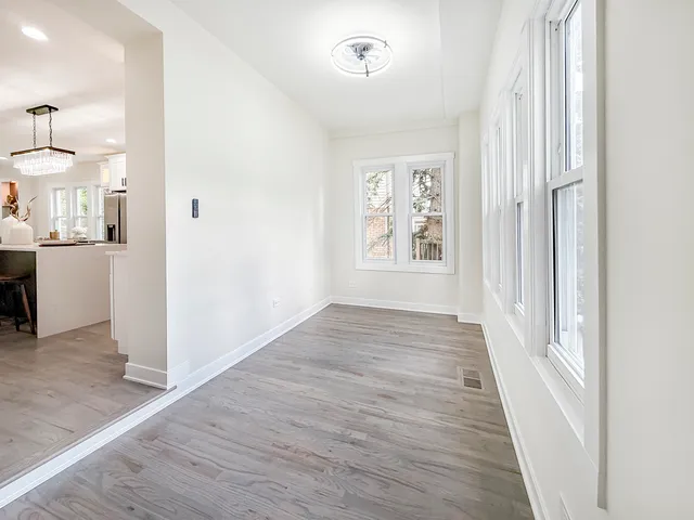 a view of an empty room and window
