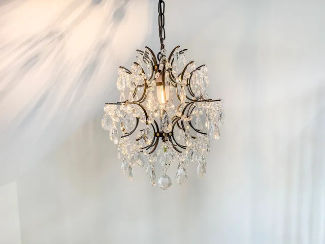 a vase with flowers sitting on a table