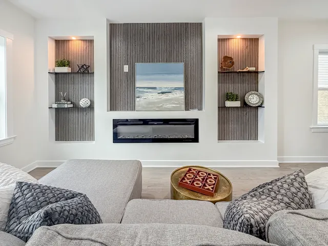 a living room with a couch and a window