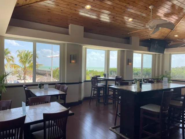 a view of a chairs and table in a patio