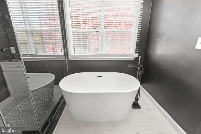 a view of outdoor space with wooden floor