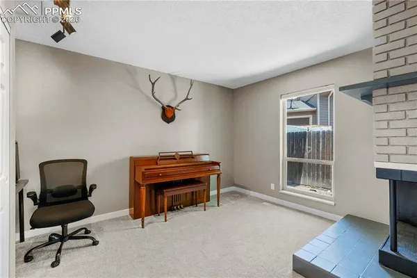 a room with furniture and a window