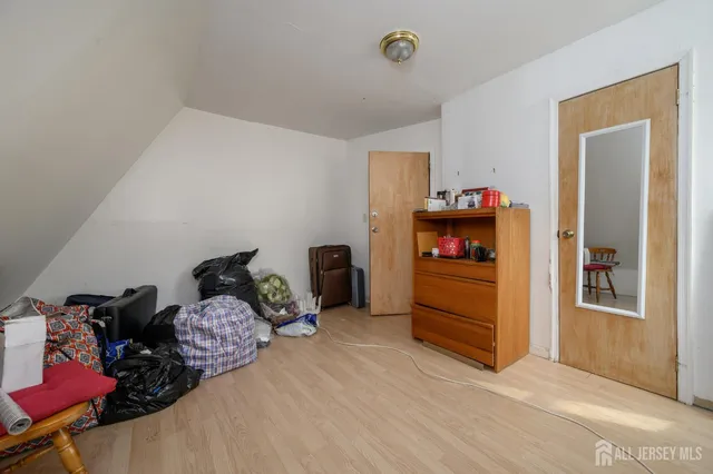 a view of a car in front of a building