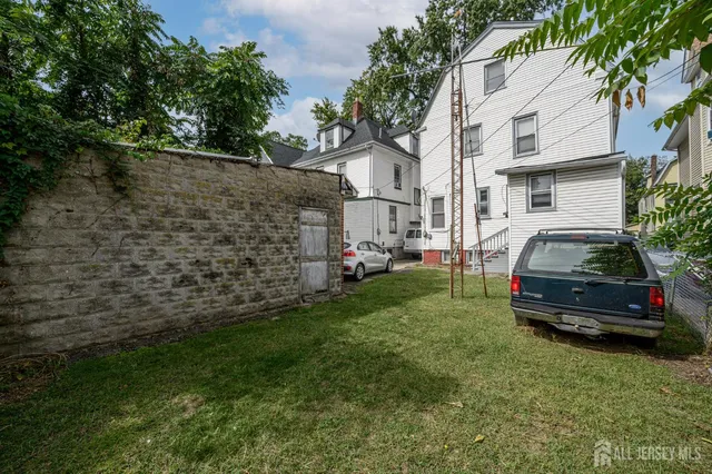 a car parked in front of a house