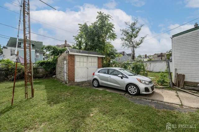 a car parked in front of a house