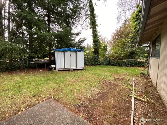 a view of backyard with green space