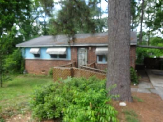 336 Macedonia Road Southeast Atlanta, GA 30354 - Photo 1 of 1 a front view of a house with yard