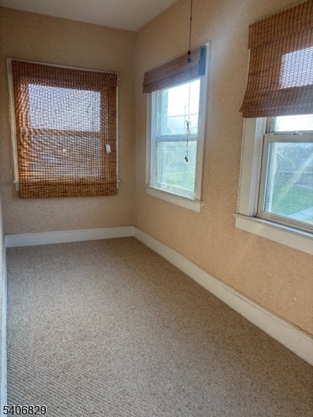 21 Main Street Linden, NJ 07036 - Photo 12 of 19 an empty room with a window