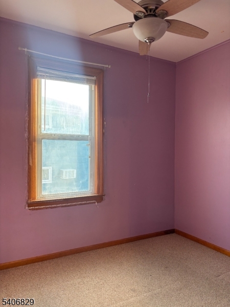 21 Main Street Linden, NJ 07036 - Photo 17 of 19 an empty room with a window