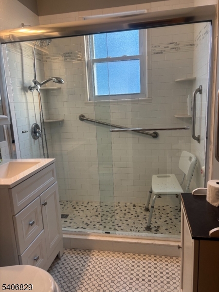 21 Main Street Linden, NJ 07036 - Photo 19 of 19 a bathroom with a sink and a shower