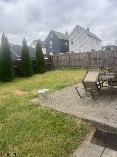 21 Main Street Linden, NJ 07036 - Photo 3 of 19 a swimming pool with outdoor seating and yard