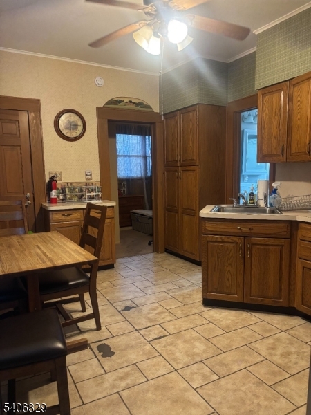 21 Main Street Linden, NJ 07036 - Photo 5 of 19 a kitchen with a sink a stove a refrigerator and cabinets