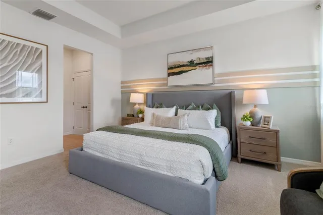 a bed room with a bed and a couch