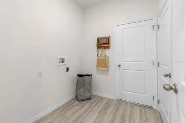 a view of small space with wooden floor