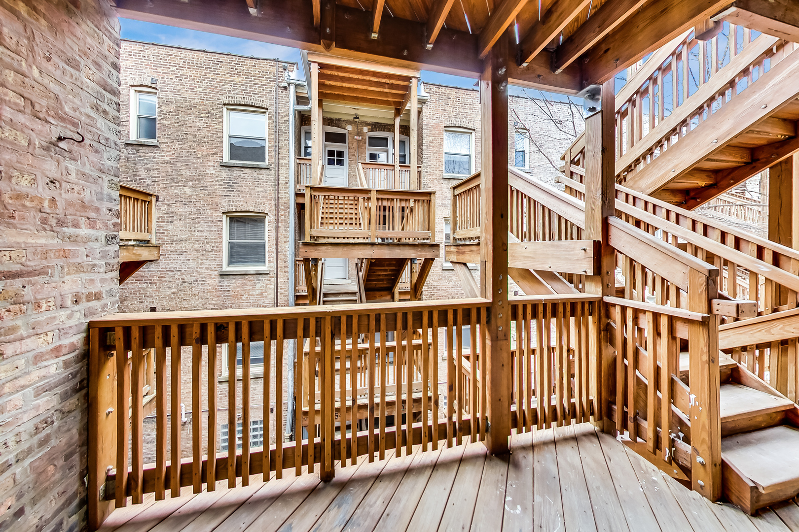 932 Pleasant Street, Unit 2W Oak Park, IL 60302 - Photo 19 of 21 a view of a brick building from a balcony
