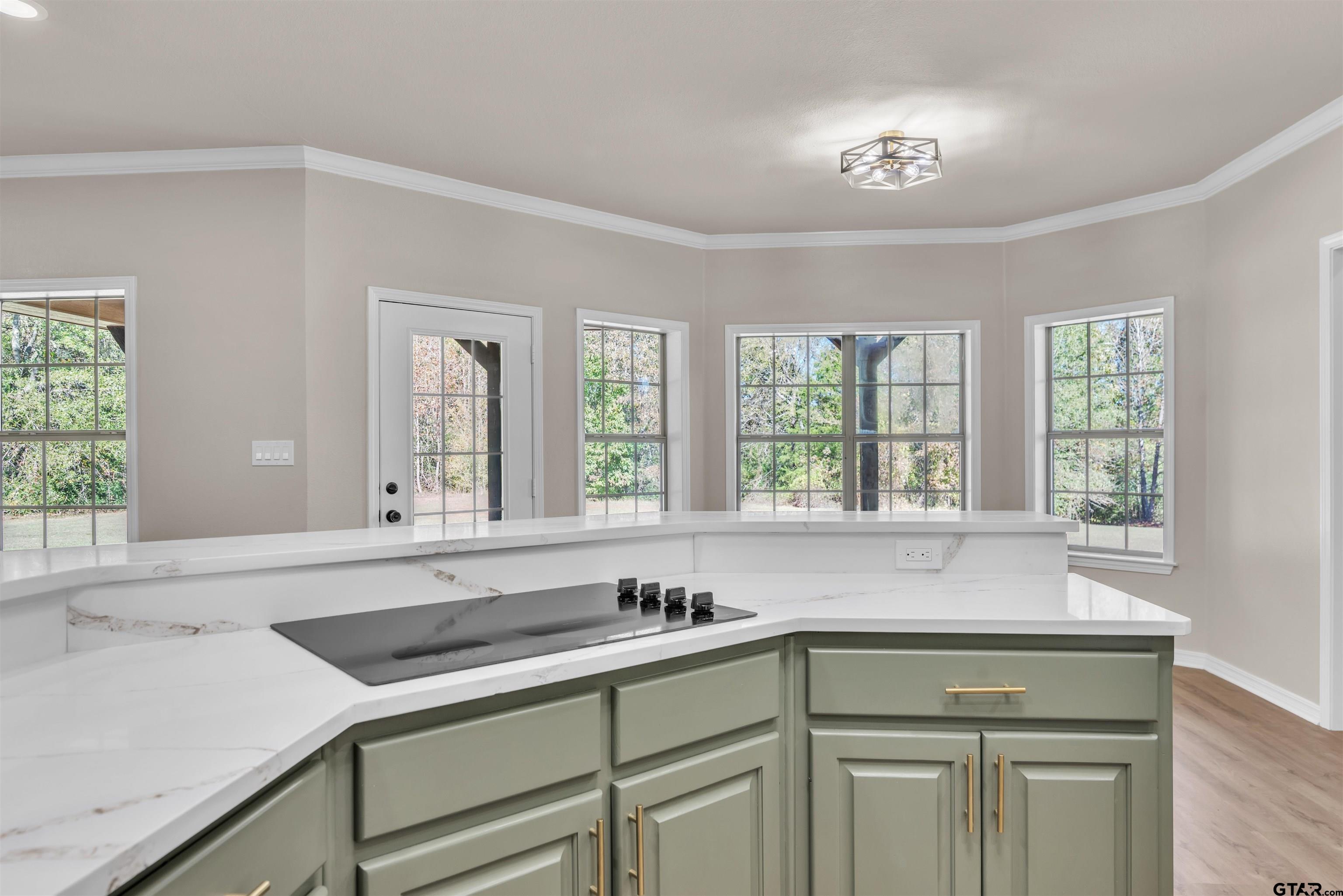 7589 Weeping Willow Road Big Sandy, TX 75755 - Photo 14 of 48 a sink with a window and cabinets