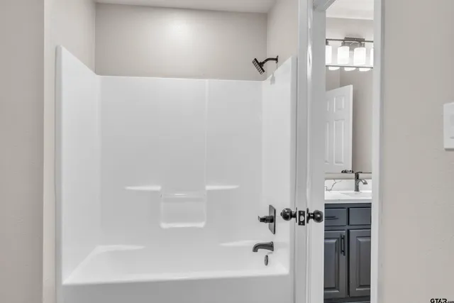 a bathroom with a bathtub