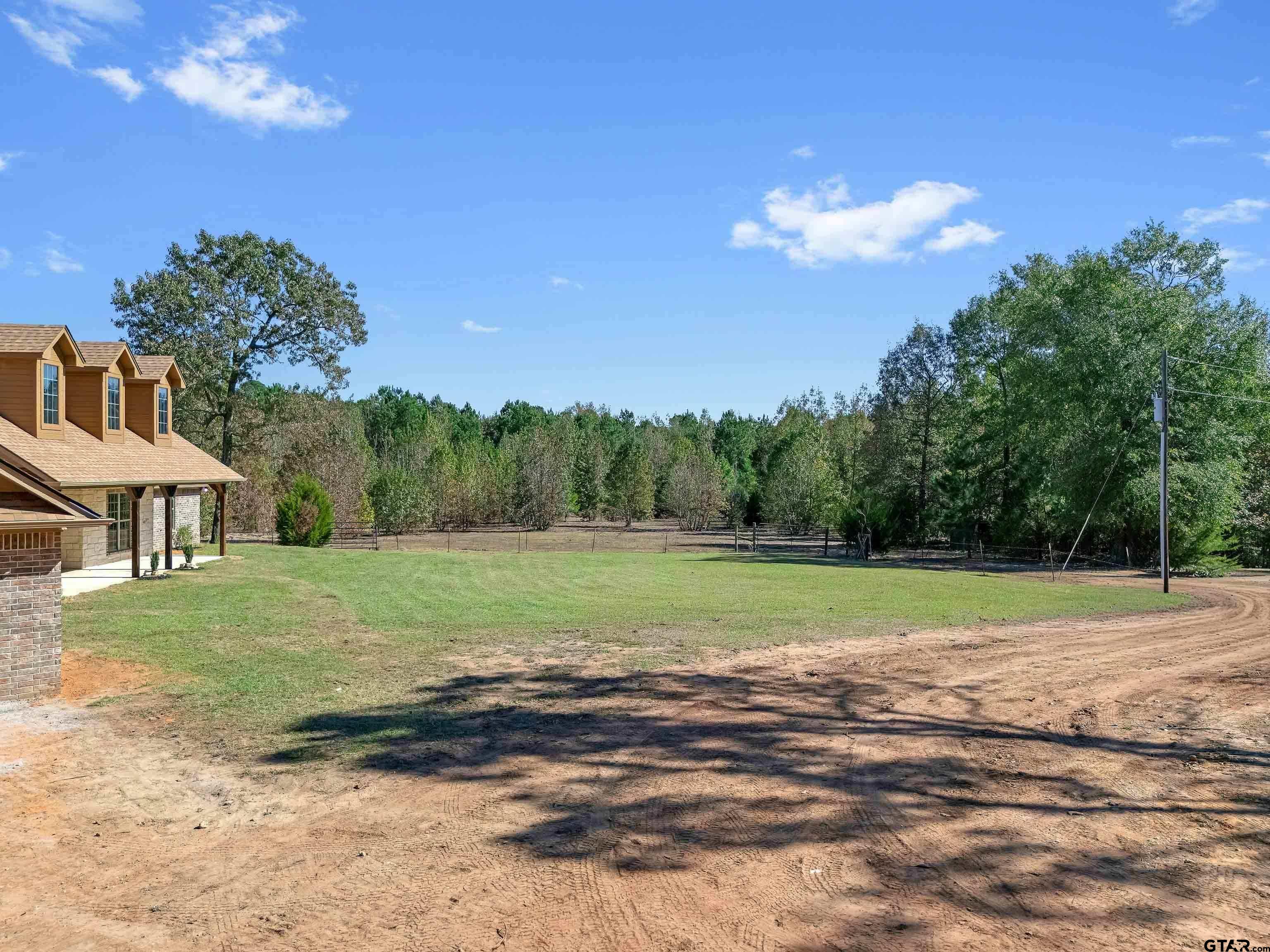 7589 Weeping Willow Road Big Sandy, TX 75755 - Photo 42 of 48 a view of big yard with a big yard