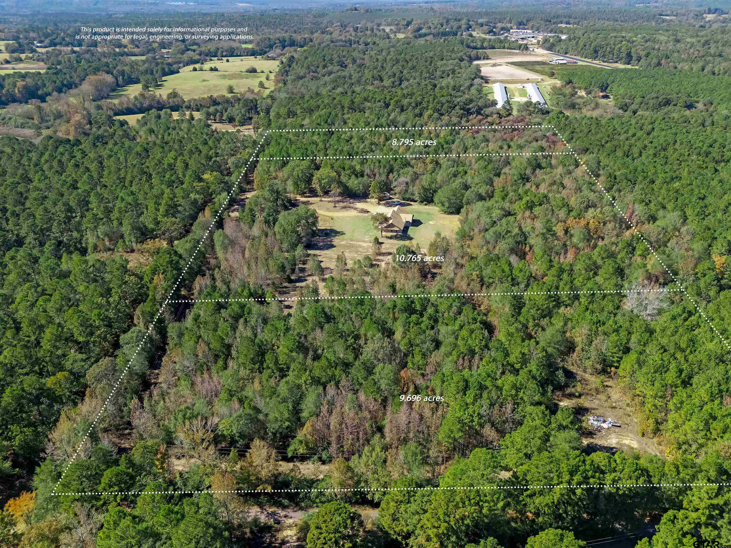 7589 Weeping Willow Road Big Sandy, TX 75755 - Photo 48 of 48 an aerial view of residential houses with outdoor space and trees