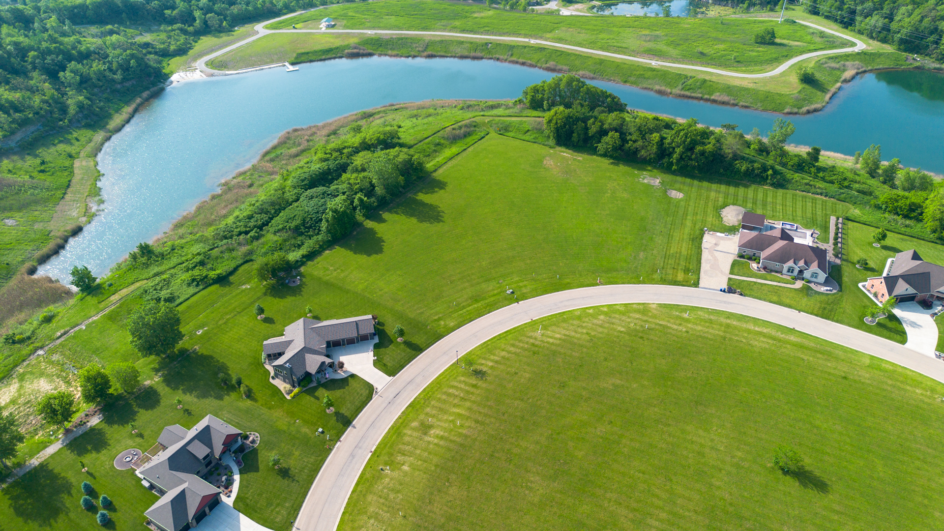 Lot 34 Vermilionvue Trace LaSalle, IL 61301 - Photo 6 of 27 a backyard of a house with lots of green space and deers
