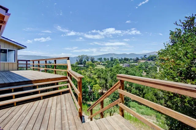 a view of balcony with furniture