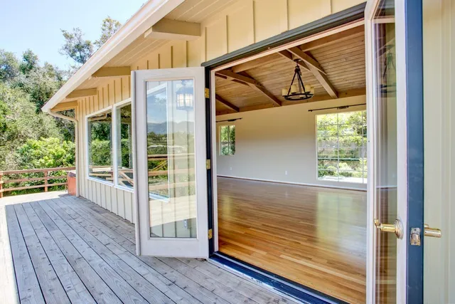 a view of front door deck of the house