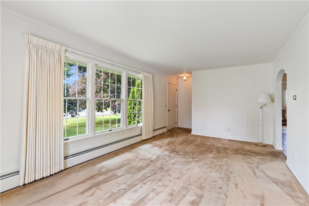 6592 Tuckahoe Road Williamson, NY 14589 - Photo 17 of 40 The front living room- note the OVERSIZED window for plenty of natural sunlight!