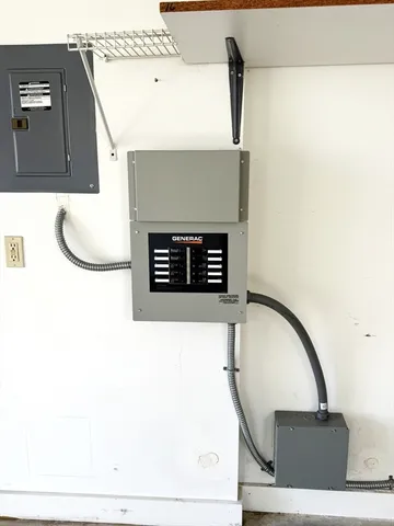 a picture of a bathroom with sink and mirror