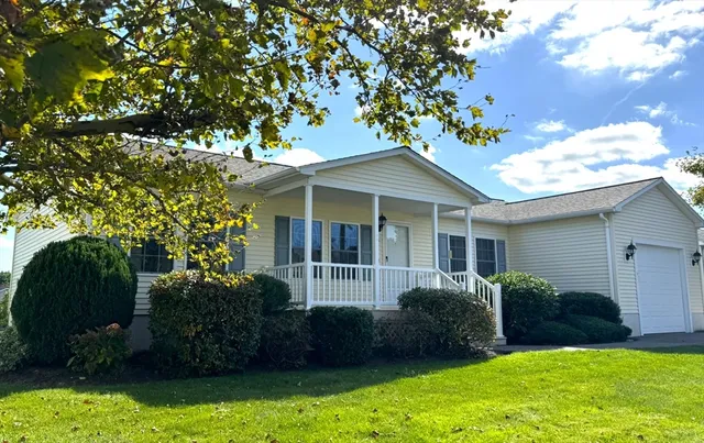 a view of a house with a garden