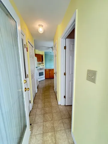 a hallway with a stove