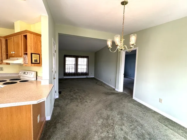 a view of a kitchen and a sink