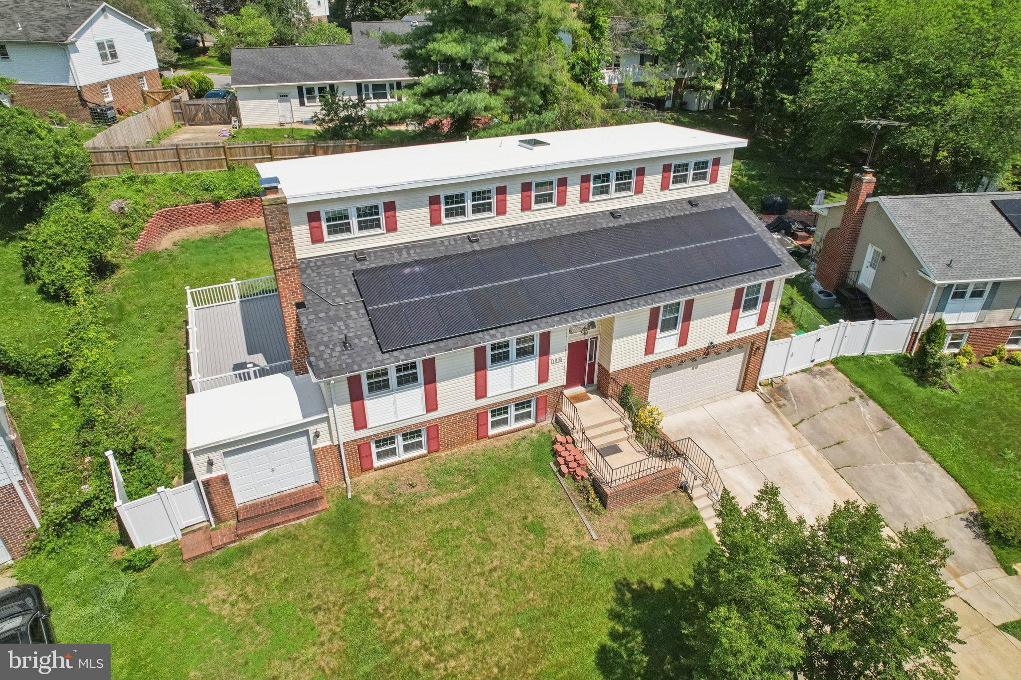 1005 Kings Tree Drive Bowie, MD 20721 - Photo 43 of 71 an aerial view of a house with a yard table and chairs