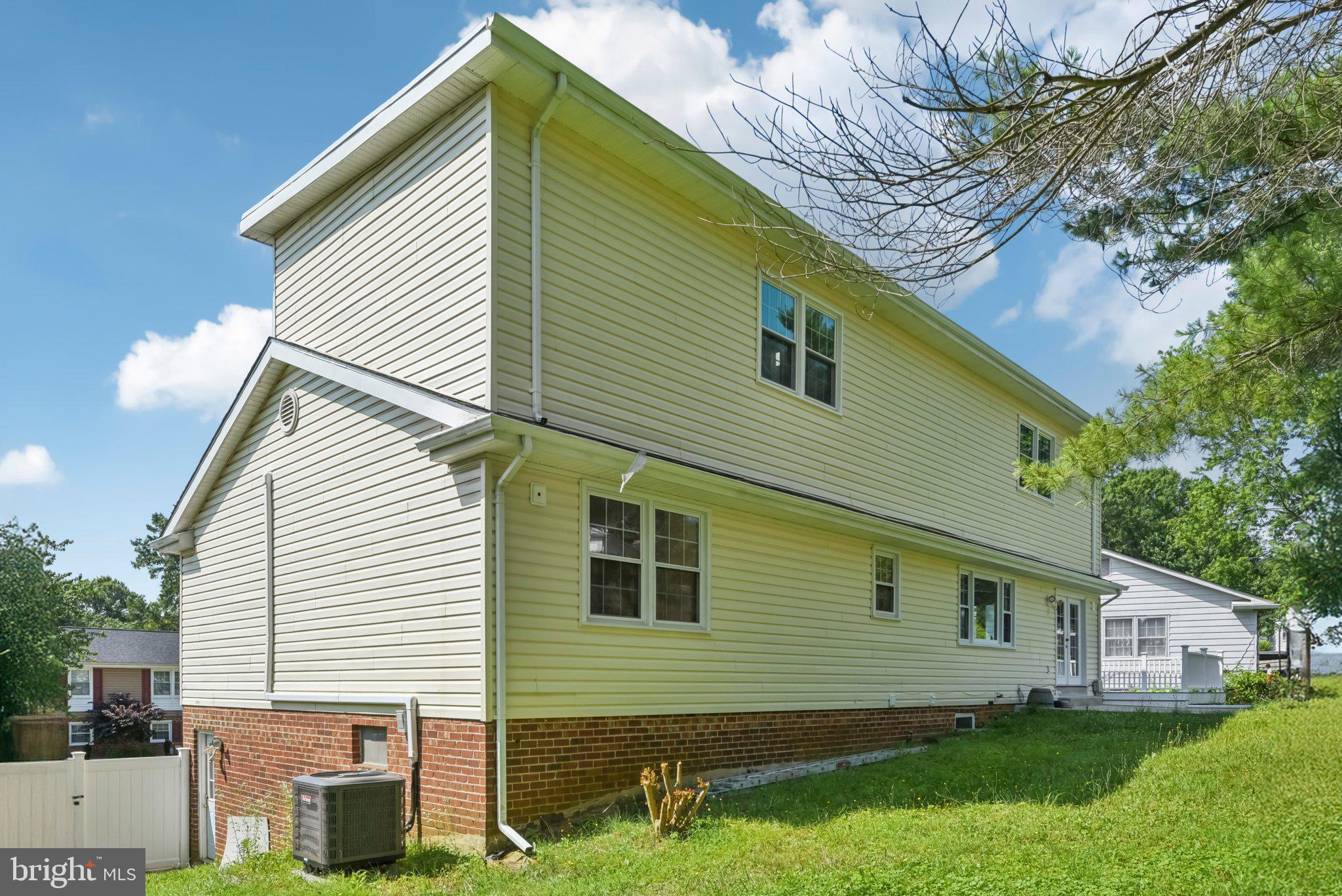 1005 Kings Tree Drive Bowie, MD 20721 - Photo 46 of 71 a view of a house with a yard