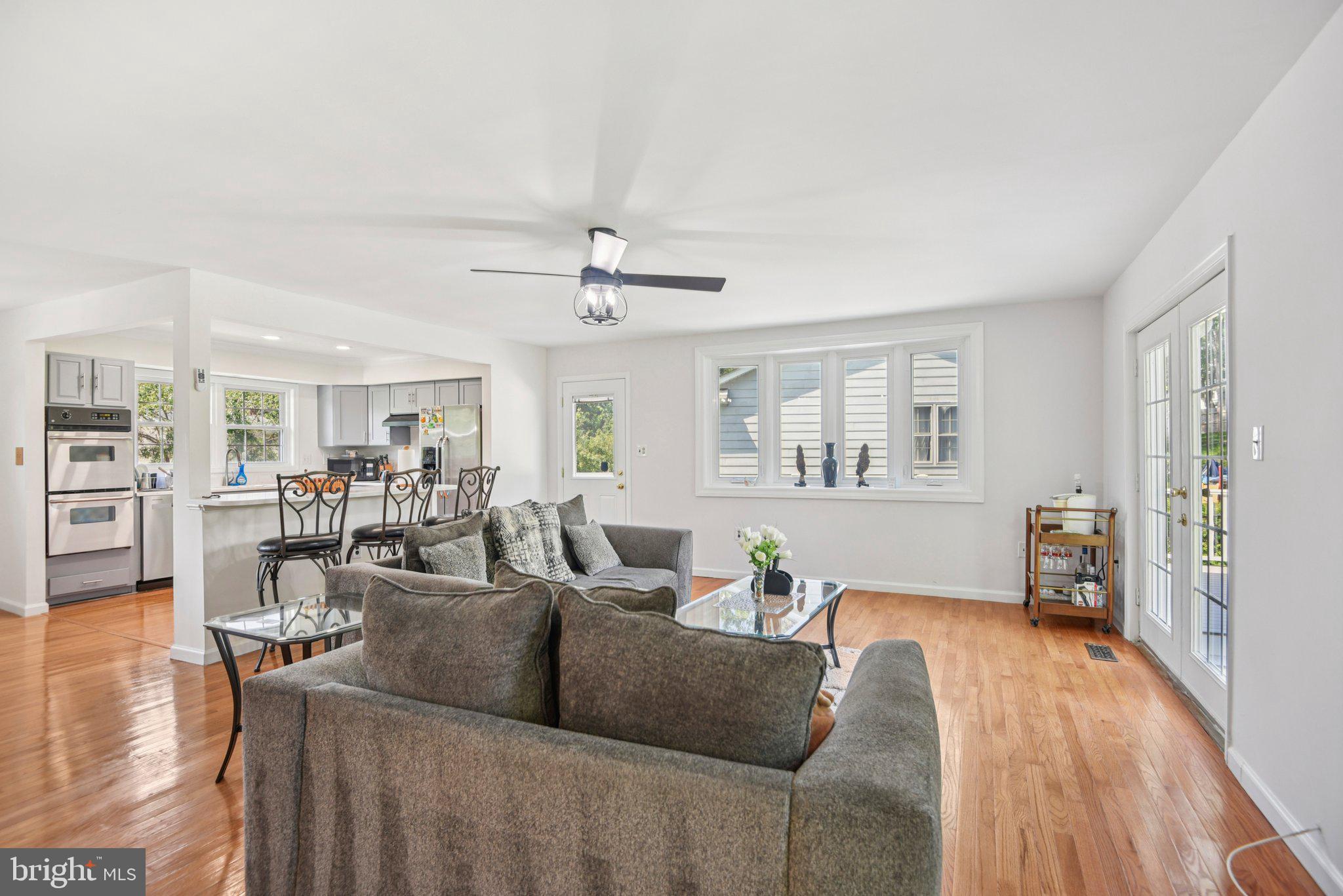 1005 Kings Tree Drive Bowie, MD 20721 - Photo 8 of 71 a living room with furniture and wooden floor