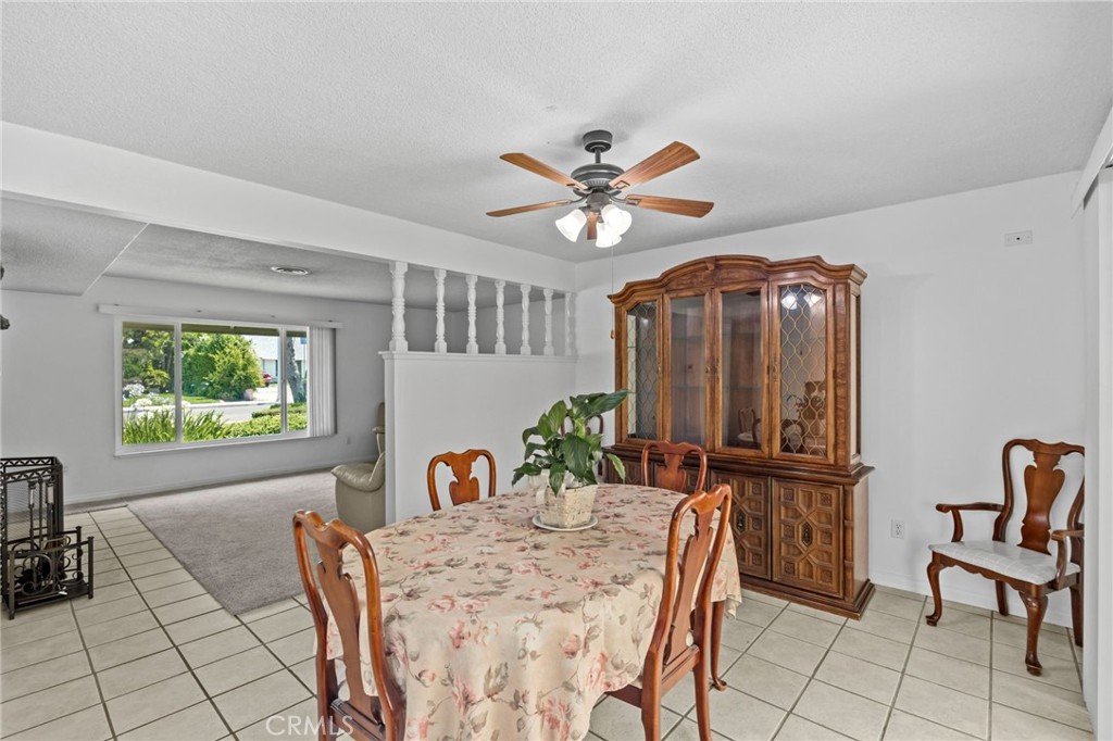 2994 Bautista Street Riverside, CA 92506 - Photo 11 of 37 a view of a dining room with furniture and a chandelier