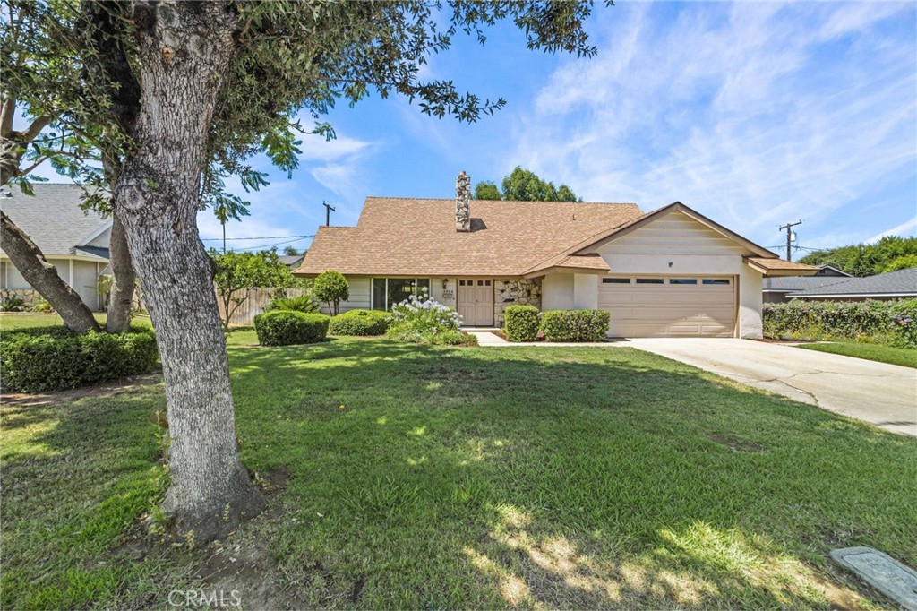 2994 Bautista Street Riverside, CA 92506 - Photo 3 of 37 a front view of a house with a yard