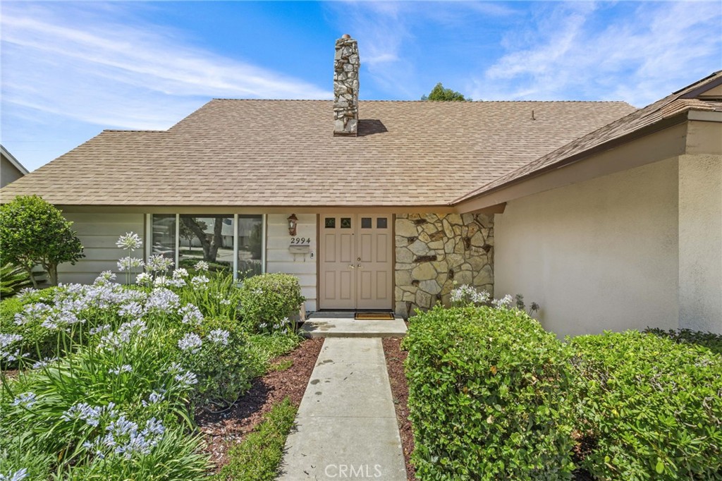 2994 Bautista Street Riverside, CA 92506 - Photo 5 of 37 a front view of a house with garden