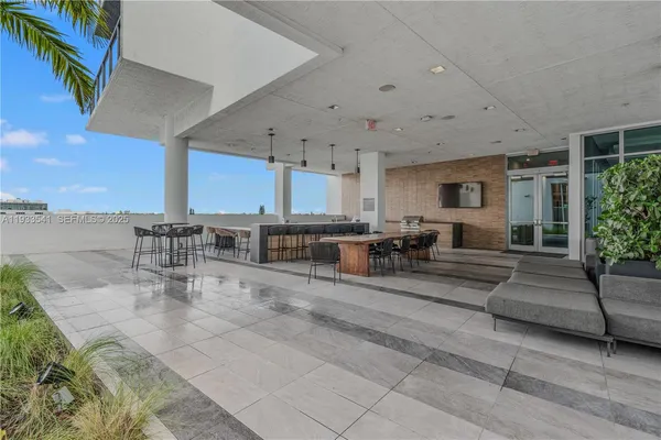 a living room with furniture and a view of living room