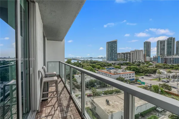 a view of a city skyline from a balcony