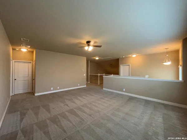 a bathroom with a white bath tub and a shower