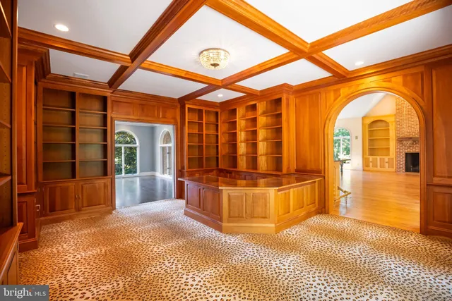 a view of front door of house with wooden floor