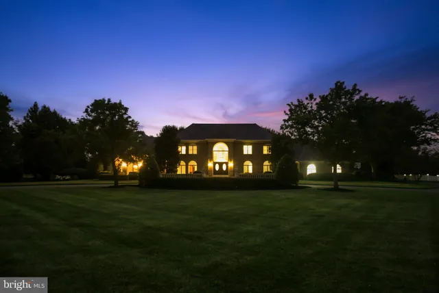 a big yard with large trees