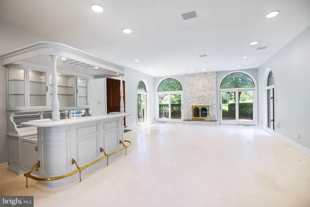 a kitchen with a sink stove and refrigerator