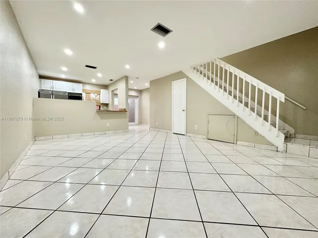 a bathroom with a sink and a shower