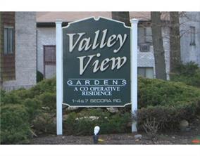 7 Secora Road, Unit H8 Monsey, NY 10952 - Photo 1 of 1 a sign broad on the side of the building