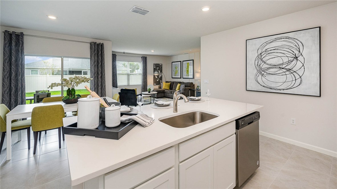 938 Riviera Avenue Sebastian, FL 32958 - Photo 10 of 30 a living room with furniture and a large window
