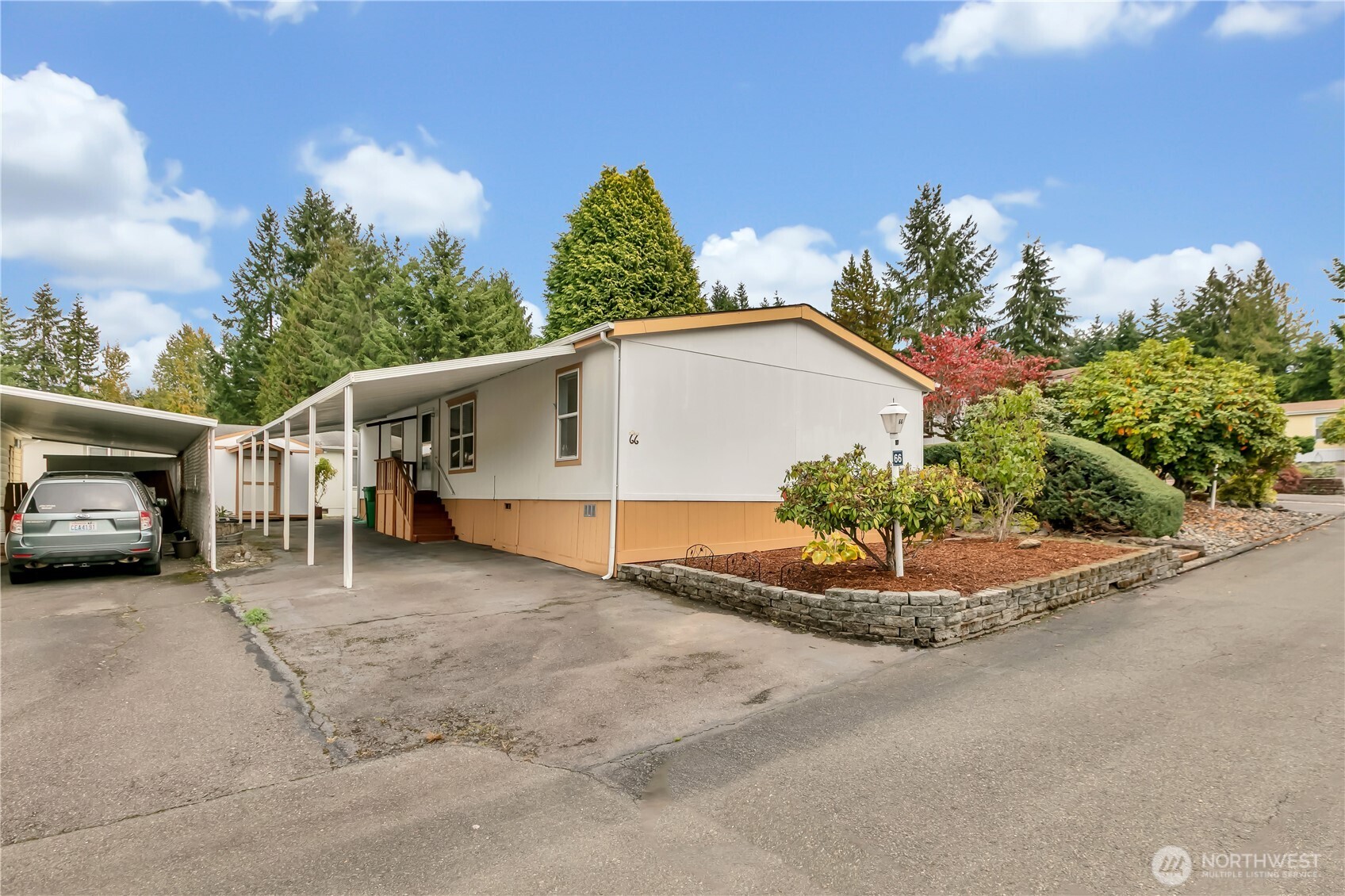2200 196th Street Southeast, Unit 66 Bothell, WA 98012 - Photo 1 of 26 a view of a house with a garage