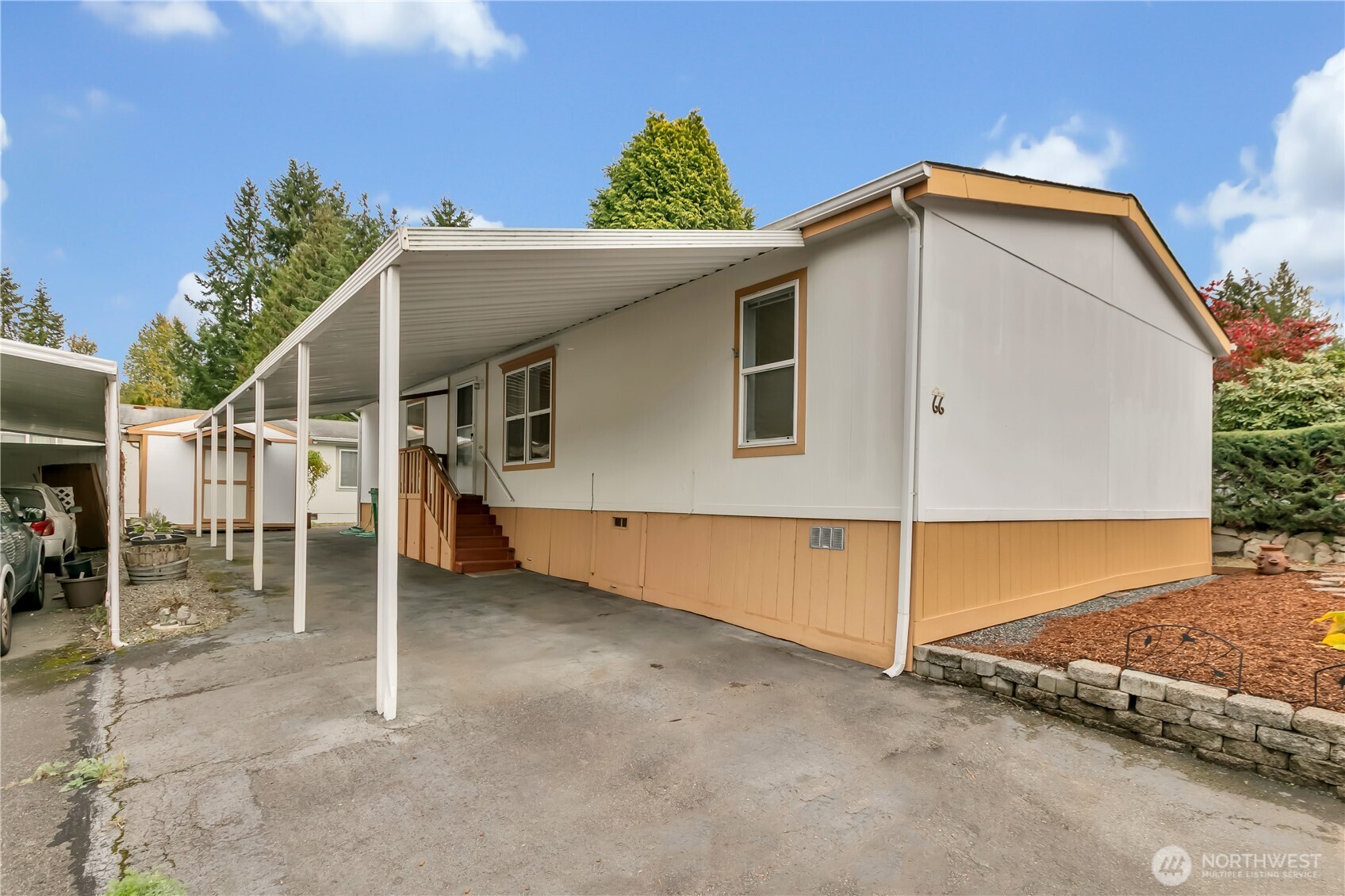 2200 196th Street Southeast, Unit 66 Bothell, WA 98012 - Photo 2 of 26 a view of an house with backyard