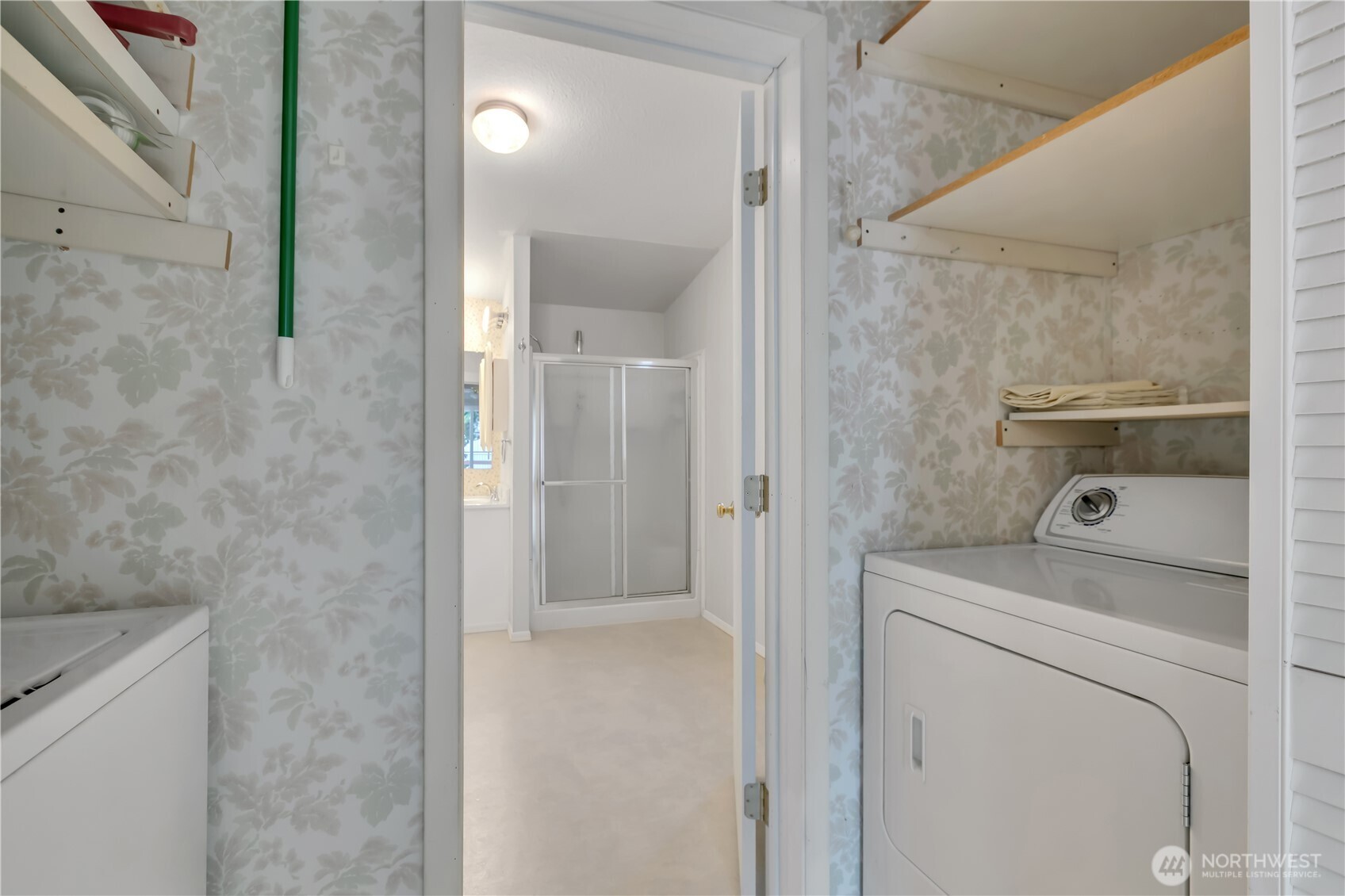 2200 196th Street Southeast, Unit 66 Bothell, WA 98012 - Photo 22 of 26 a bathroom with a washer and dryer
