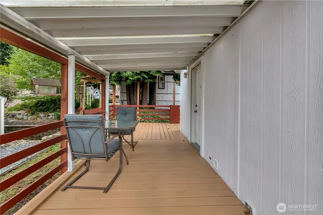 a patio with patio table and chairs